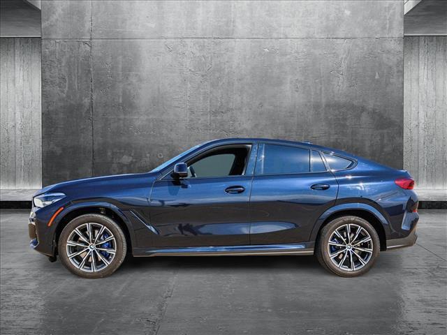 used 2023 BMW X6 car, priced at $56,991