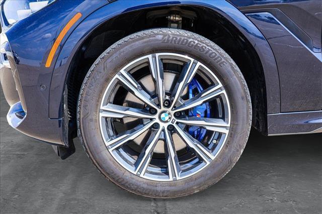used 2023 BMW X6 car, priced at $56,991