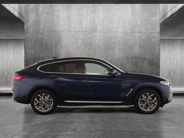 used 2025 BMW X4 car, priced at $60,760