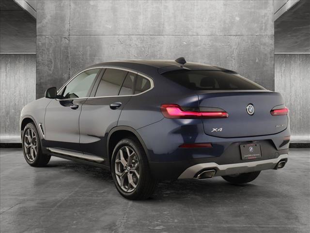 used 2025 BMW X4 car, priced at $60,760