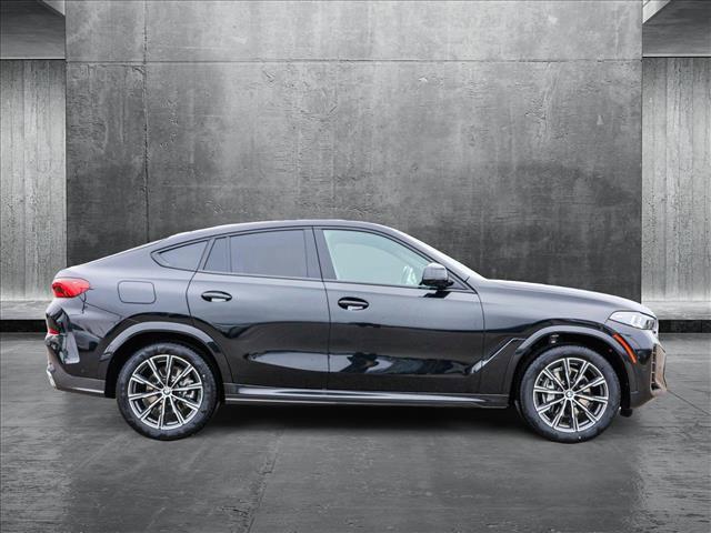 new 2025 BMW X6 car, priced at $77,875