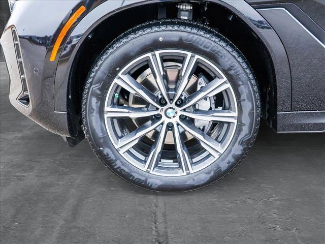 new 2025 BMW X6 car, priced at $77,875