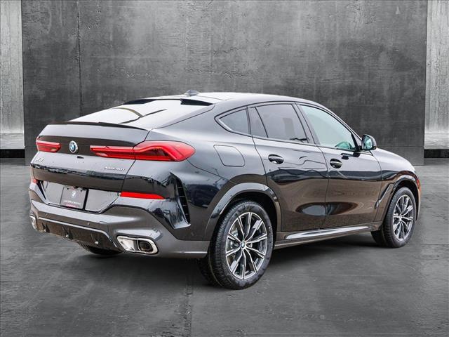 new 2025 BMW X6 car, priced at $77,875