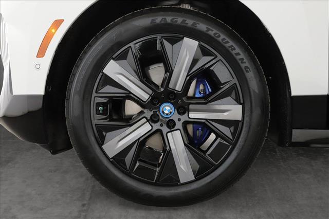 new 2024 BMW iX car, priced at $98,545