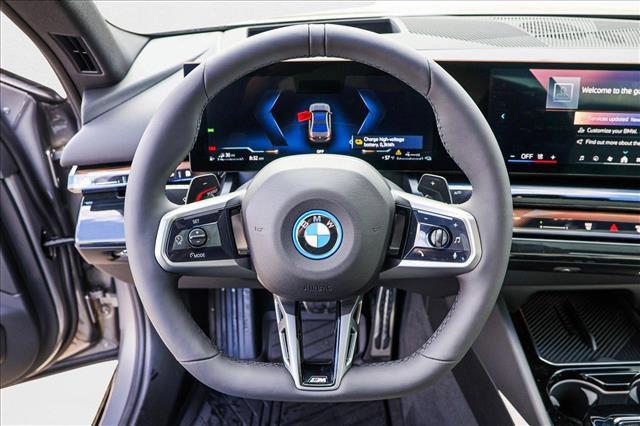 used 2026 BMW 550e car, priced at $83,165