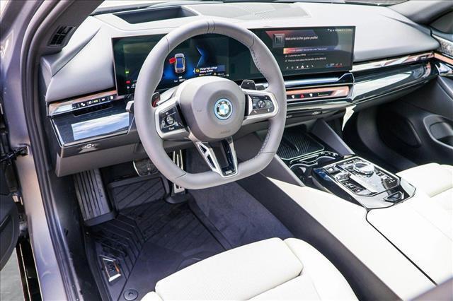 new 2026 BMW 550e car, priced at $83,165