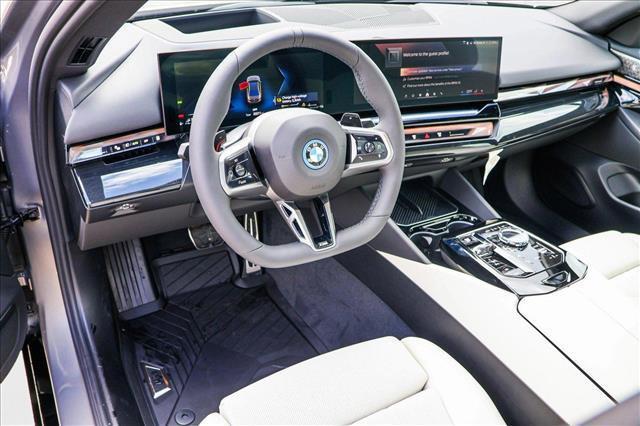 used 2026 BMW 550e car, priced at $83,165