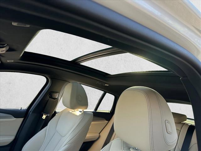 used 2025 BMW X4 car, priced at $46,991