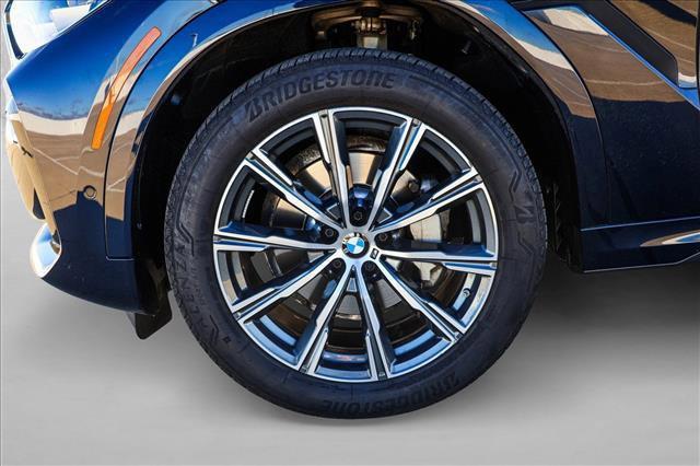 used 2023 BMW X6 car, priced at $57,491