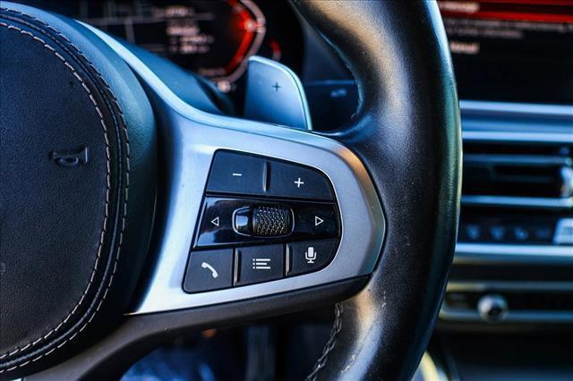 used 2023 BMW X6 car, priced at $57,491