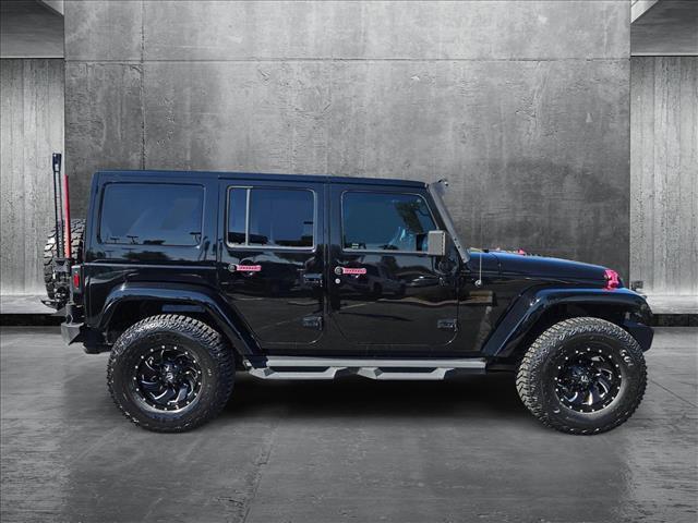 used 2017 Jeep Wrangler Unlimited car, priced at $24,289