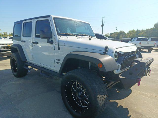 used 2014 Jeep Wrangler Unlimited car, priced at $16,995