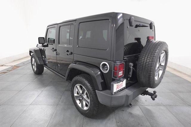 used 2011 Jeep Wrangler Unlimited car, priced at $12,495