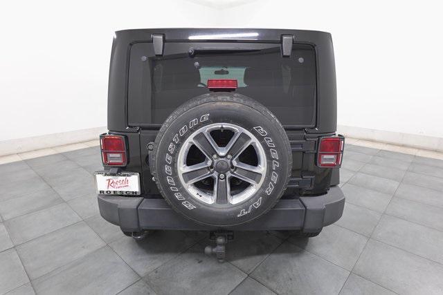 used 2011 Jeep Wrangler Unlimited car, priced at $12,495