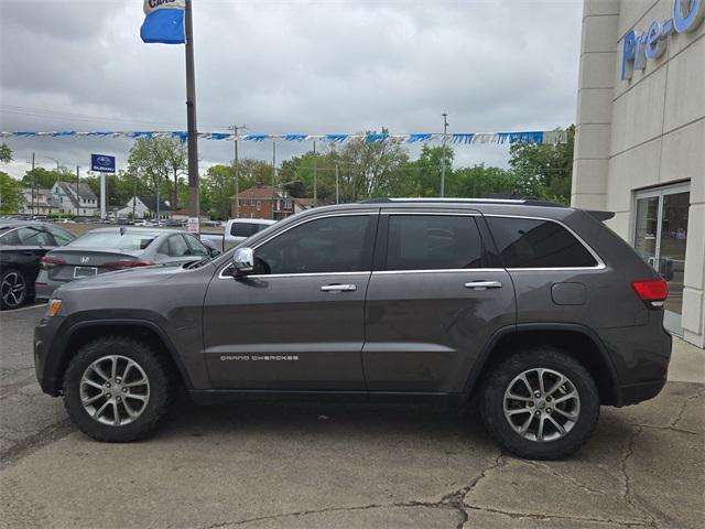 used 2014 Jeep Grand Cherokee car, priced at $10,000