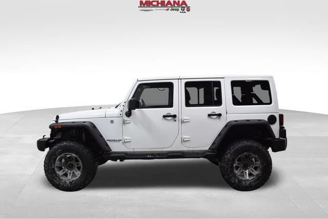 used 2014 Jeep Wrangler Unlimited car, priced at $19,492