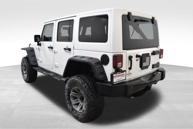 used 2014 Jeep Wrangler Unlimited car, priced at $19,492