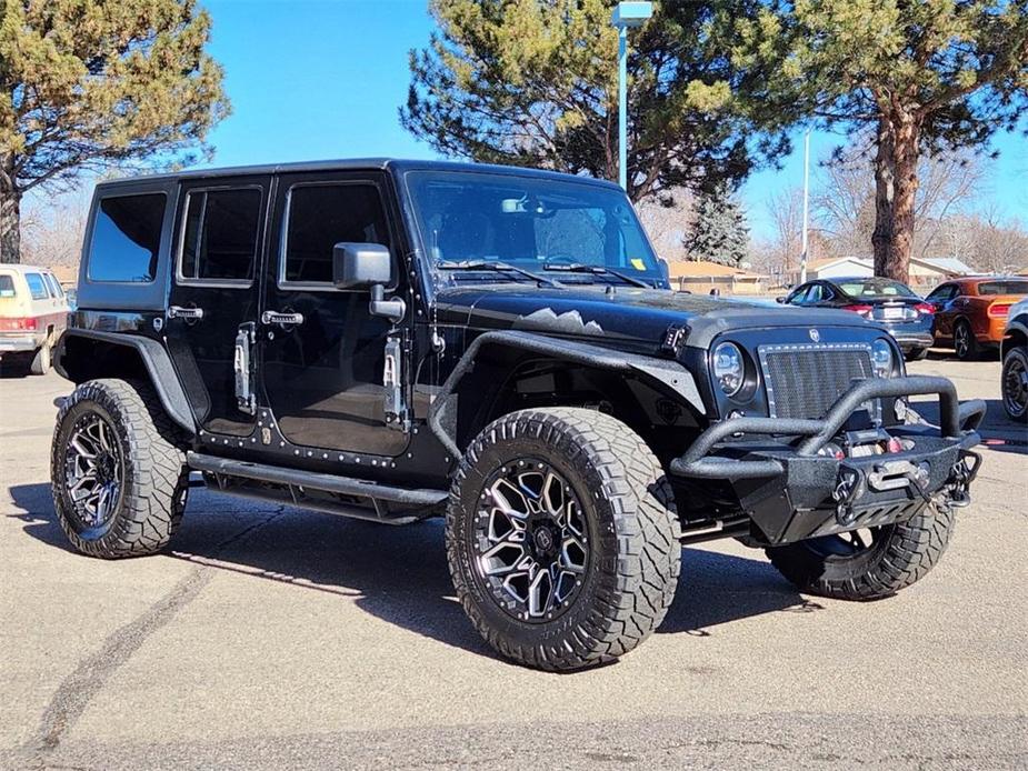 used 2014 Jeep Wrangler Unlimited car, priced at $20,503