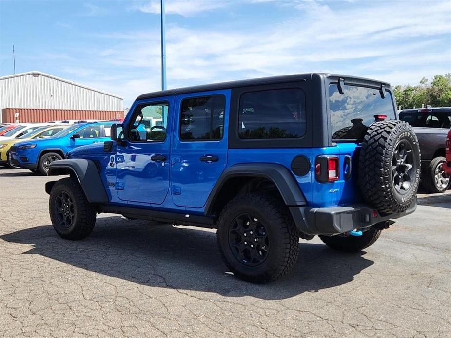 used 2023 Jeep Wrangler 4xe car, priced at $35,131