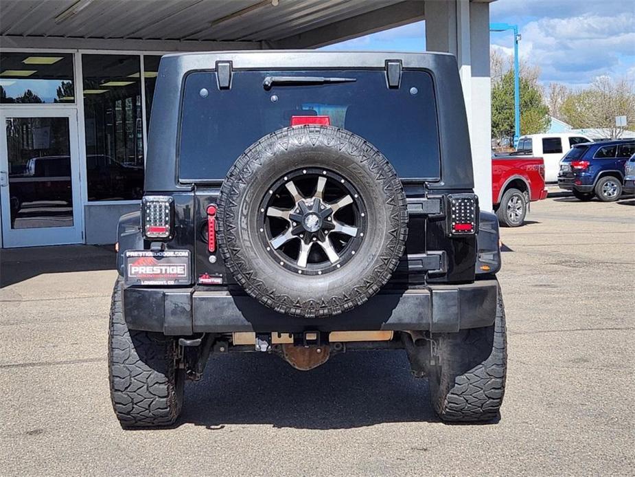 used 2013 Jeep Wrangler Unlimited car, priced at $23,903
