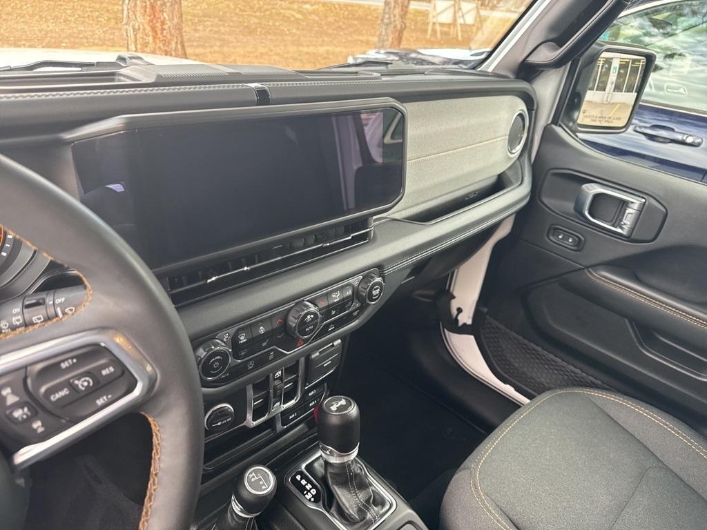 used 2024 Jeep Wrangler car, priced at $38,248