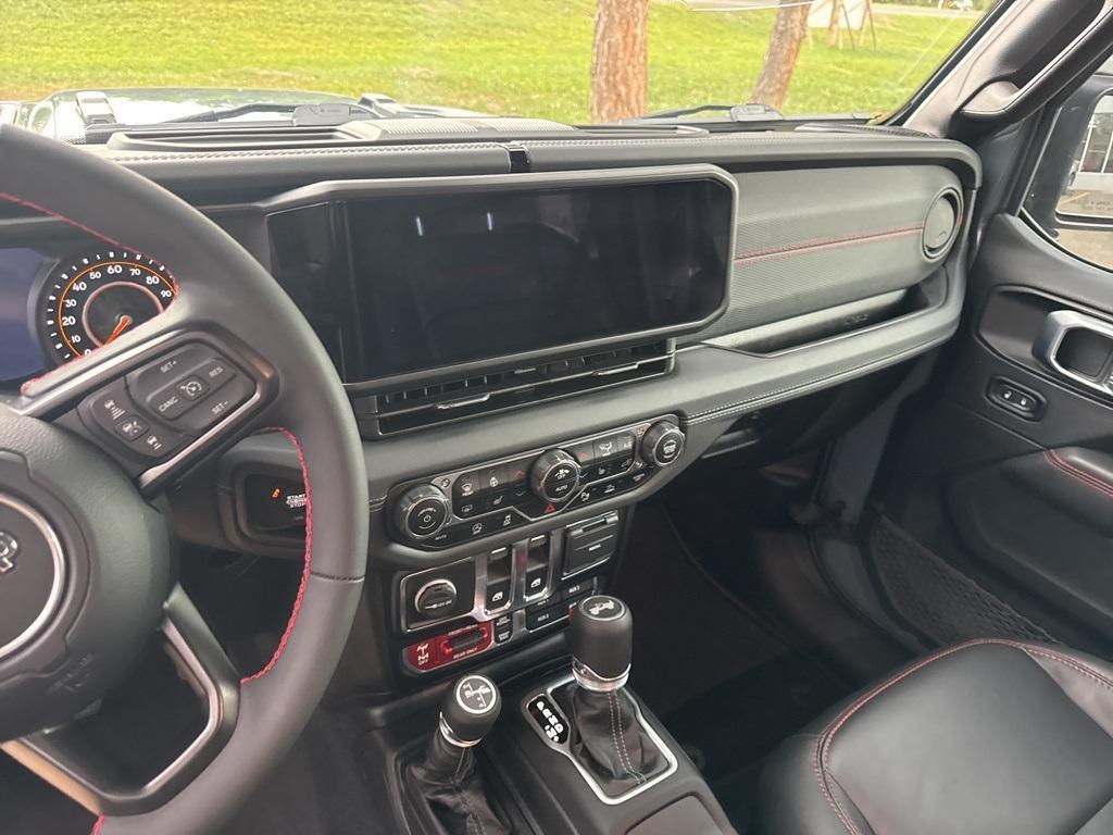 used 2024 Jeep Wrangler car, priced at $49,739