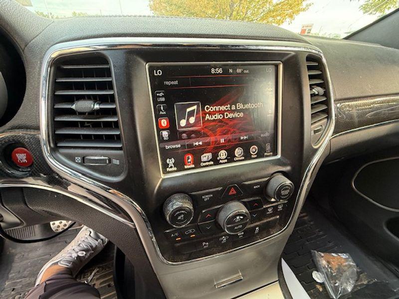 used 2015 Jeep Grand Cherokee car, priced at $27,820