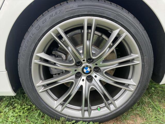 used 2022 BMW 750 car, priced at $52,677