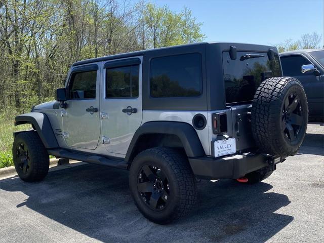 used 2016 Jeep Wrangler Unlimited car, priced at $20,972