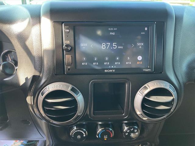 used 2016 Jeep Wrangler Unlimited car, priced at $20,432
