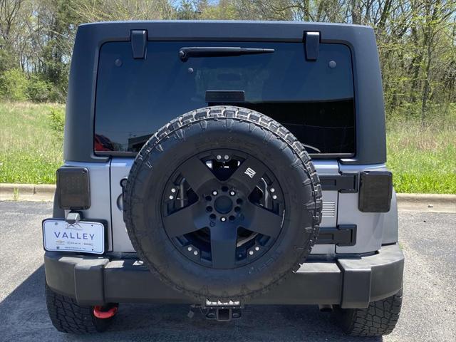 used 2016 Jeep Wrangler Unlimited car, priced at $20,972