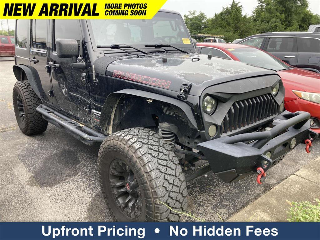 used 2013 Jeep Wrangler Unlimited car, priced at $12,972