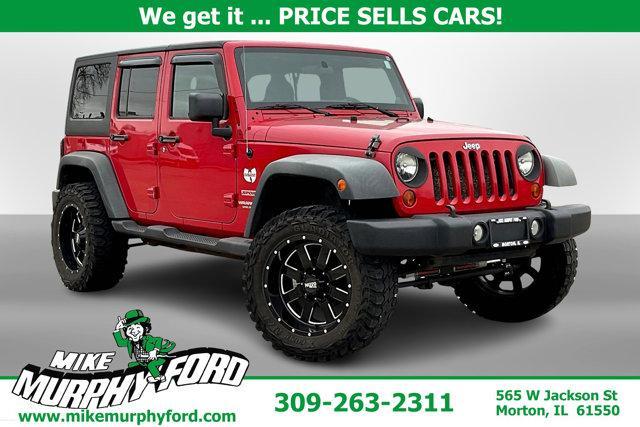 used 2011 Jeep Wrangler Unlimited car, priced at $14,595