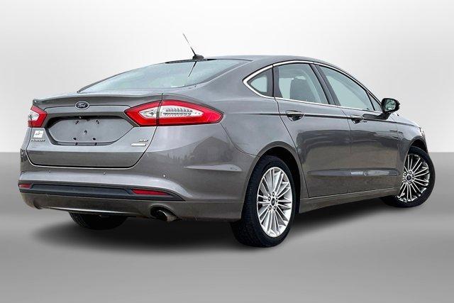 used 2014 Ford Fusion car, priced at $6,495