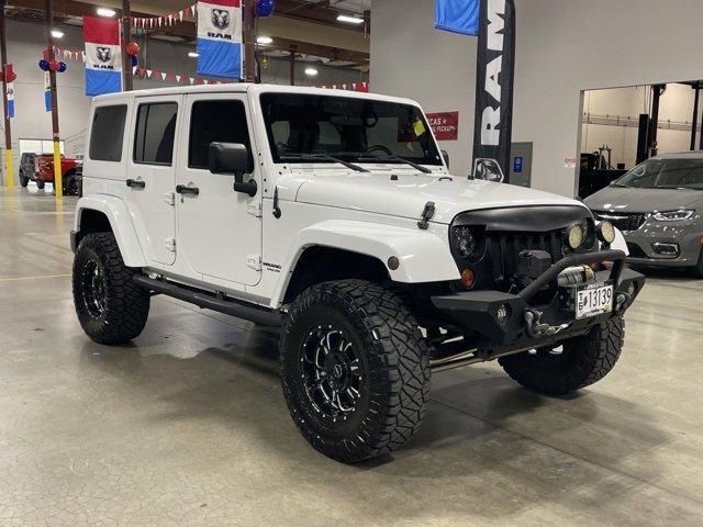 used 2012 Jeep Wrangler Unlimited car, priced at $22,047