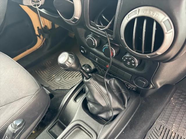 used 2014 Jeep Wrangler car, priced at $16,890