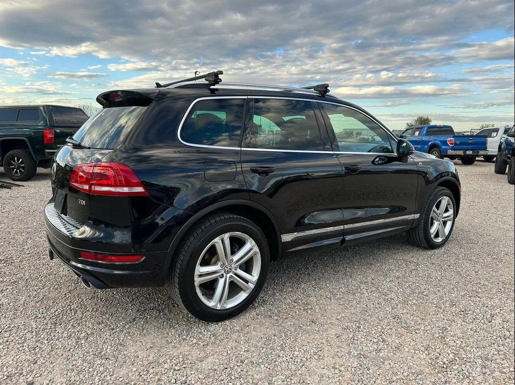 used 2014 Volkswagen Touareg car, priced at $10,900