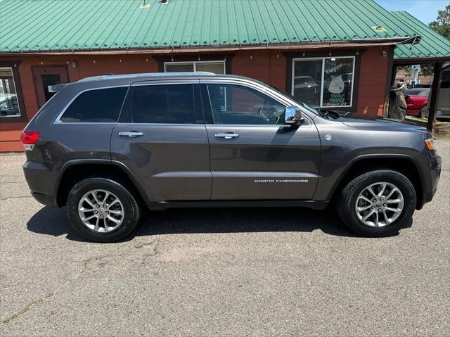 used 2015 Jeep Grand Cherokee car, priced at $14,000