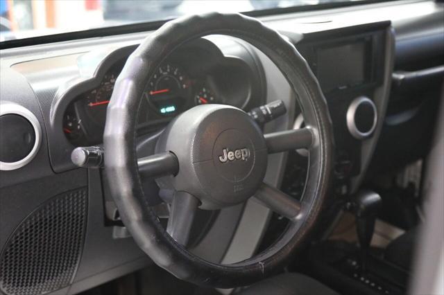 used 2009 Jeep Wrangler Unlimited car, priced at $16,896