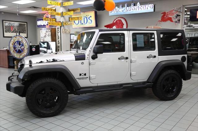 used 2009 Jeep Wrangler Unlimited car, priced at $16,896