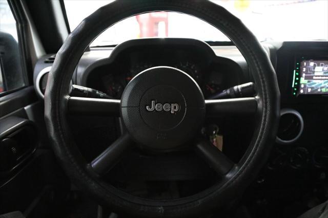 used 2009 Jeep Wrangler Unlimited car, priced at $16,896