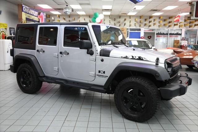 used 2009 Jeep Wrangler Unlimited car, priced at $16,896