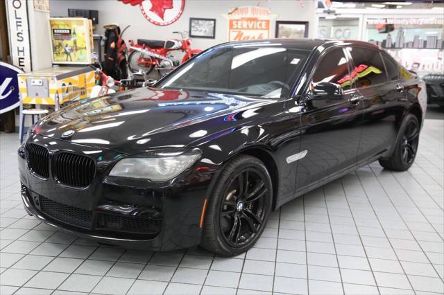 used 2011 BMW 750 car, priced at $12,896