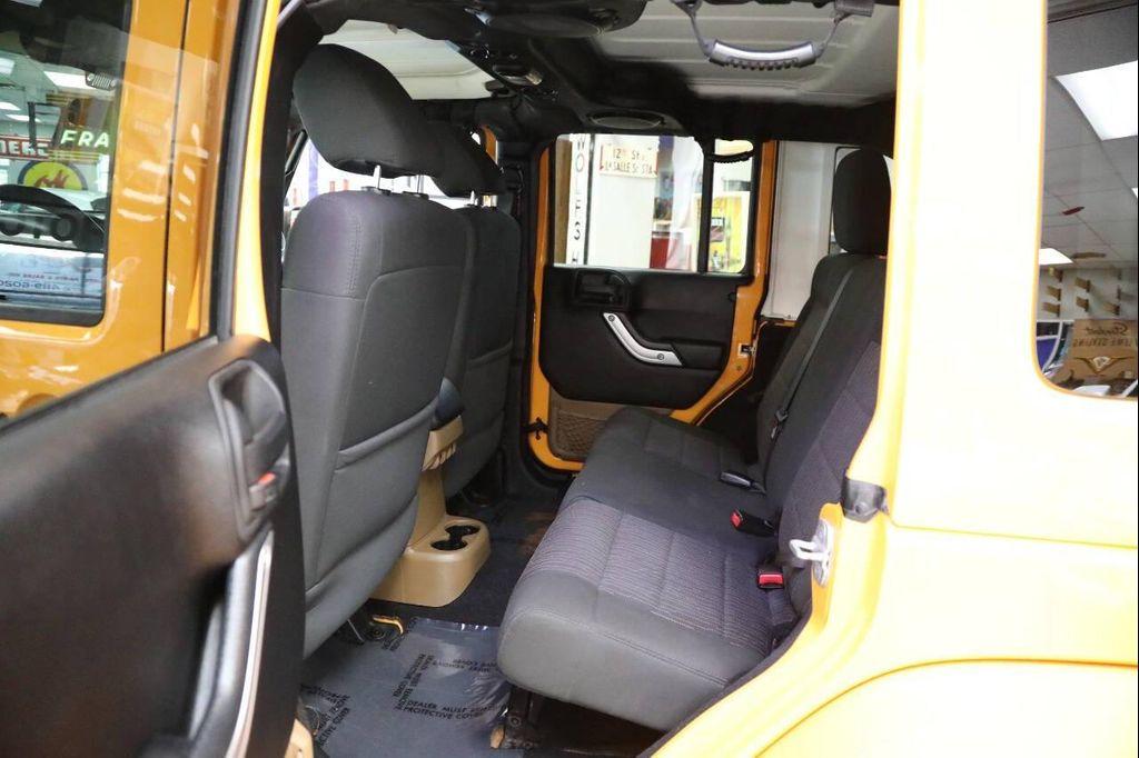 used 2012 Jeep Wrangler Unlimited car, priced at $18,896
