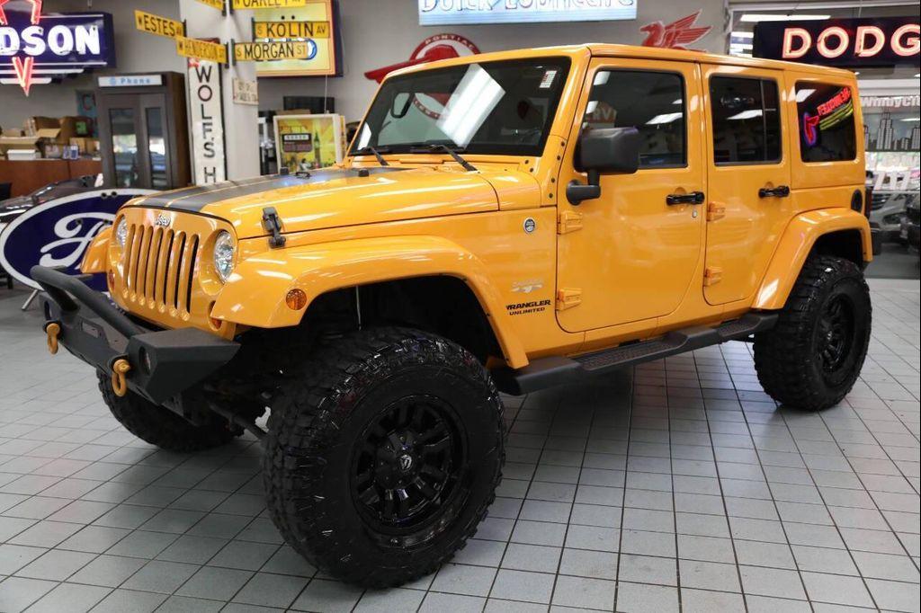 used 2012 Jeep Wrangler Unlimited car, priced at $18,896