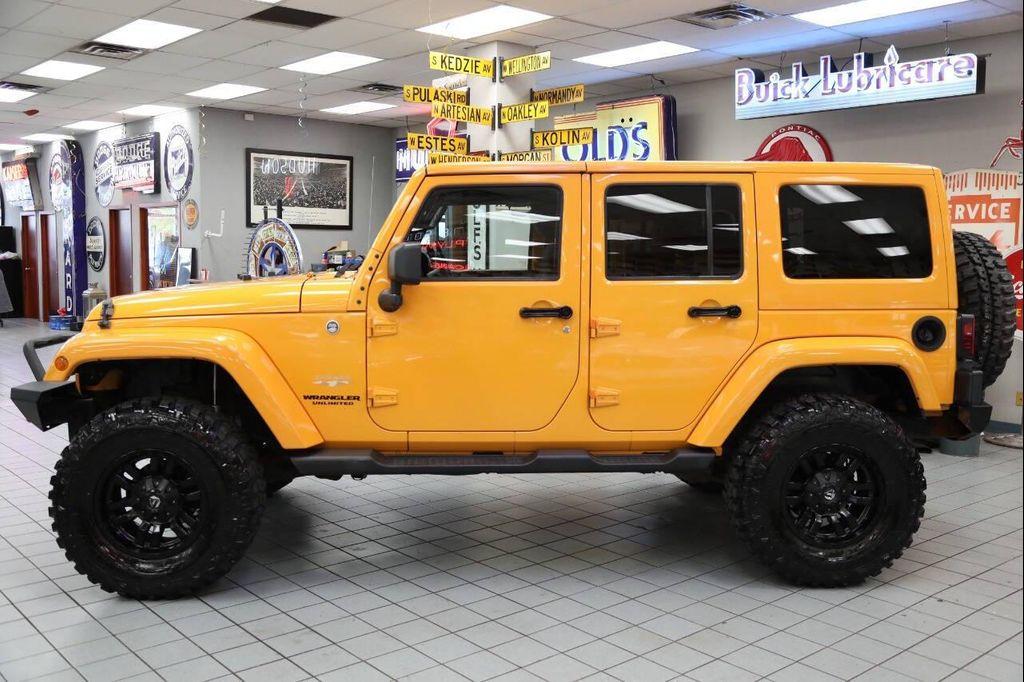 used 2012 Jeep Wrangler Unlimited car, priced at $18,896