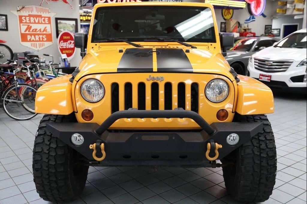 used 2012 Jeep Wrangler Unlimited car, priced at $18,896