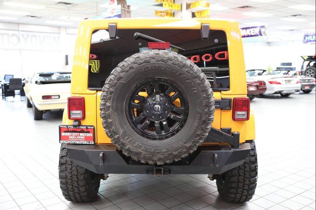 used 2012 Jeep Wrangler Unlimited car, priced at $18,896