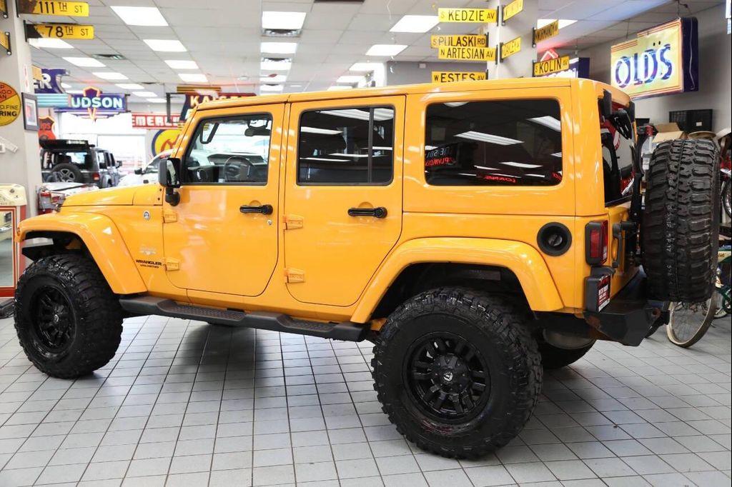 used 2012 Jeep Wrangler Unlimited car, priced at $18,896