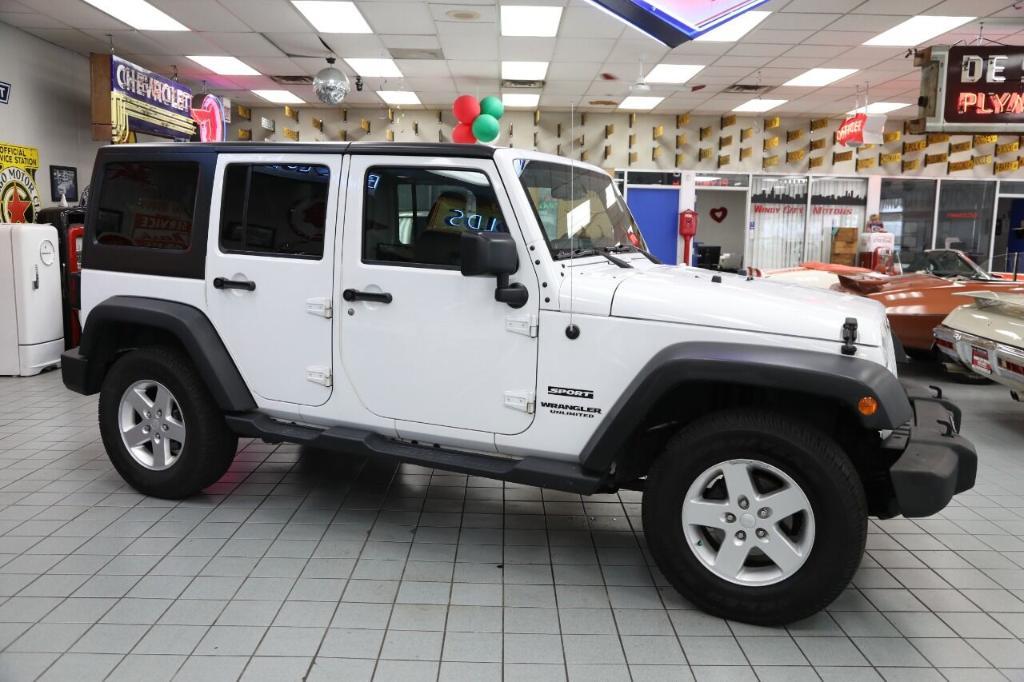 used 2016 Jeep Wrangler Unlimited car, priced at $16,850